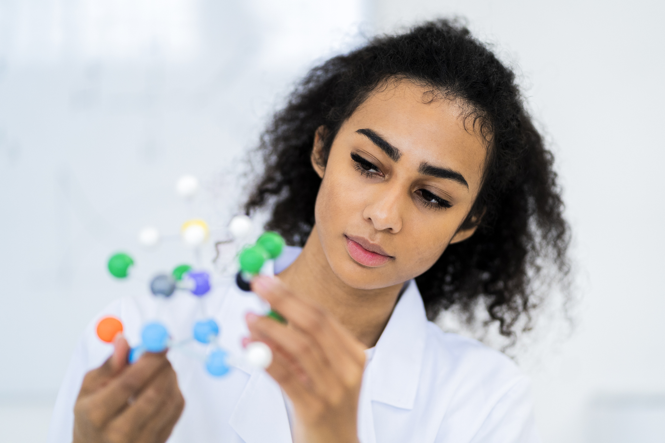 researcher examining molecular structure